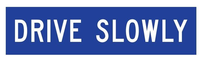 (DRIVE SLOWLY) Corflute Sign - White on Blue - 1200x300mm